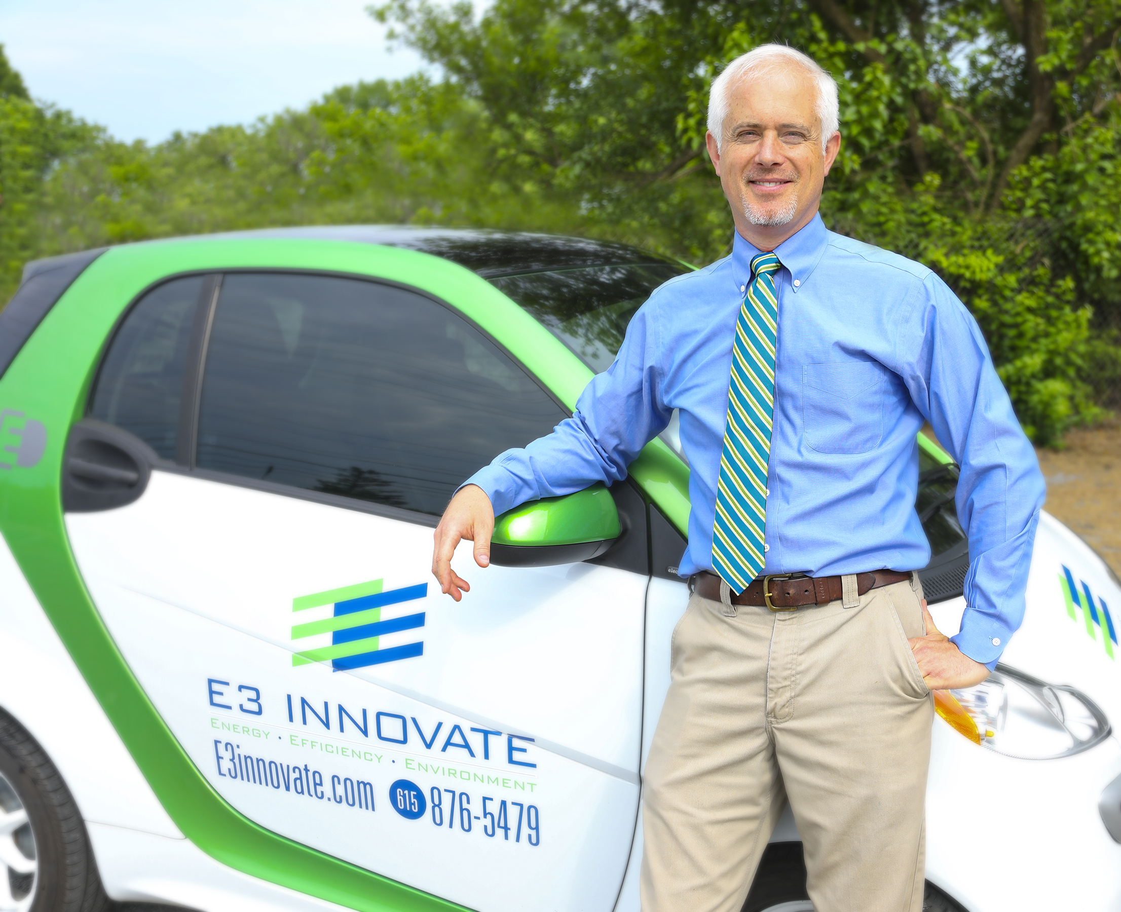 Erik Daugherty in front of E3 innovate car
