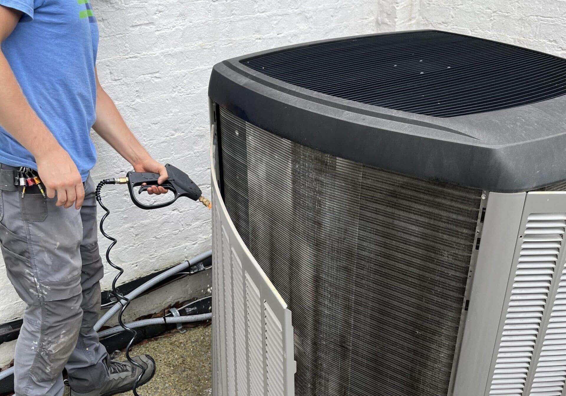 maintenance on an hvac unit outside