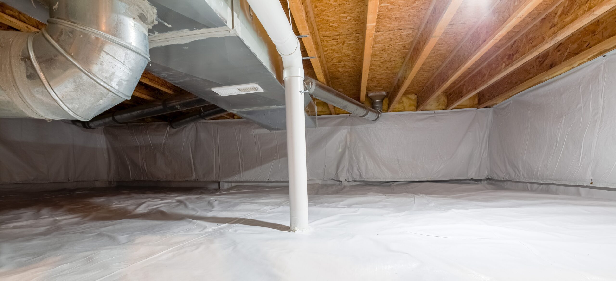 encapsulated basement with radon mitigation pipe