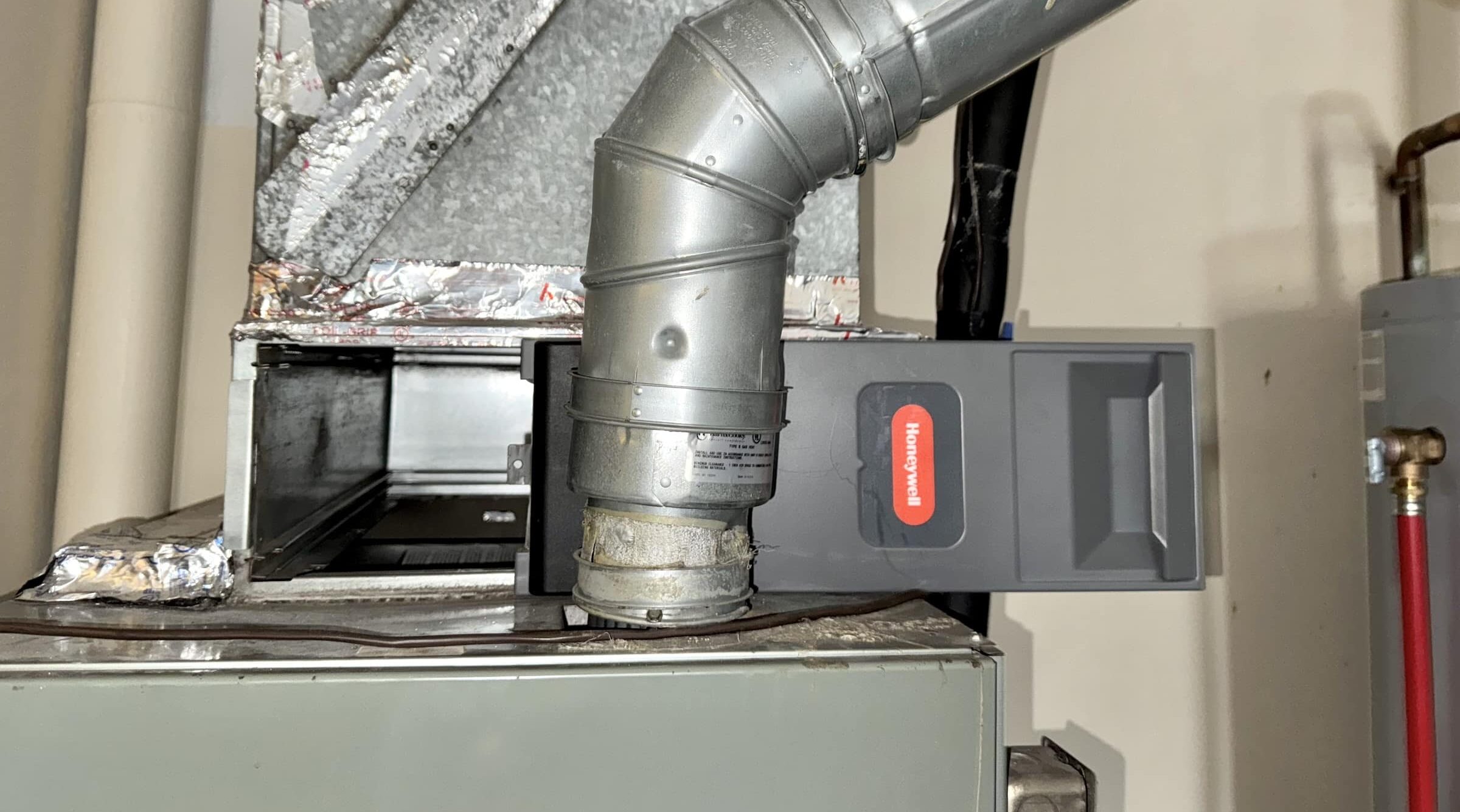 Poor Install_Filter Cabinet Obstructed by Flue-Pipe Poor Install Filter Cabinet Obstructed by Flue Pipe