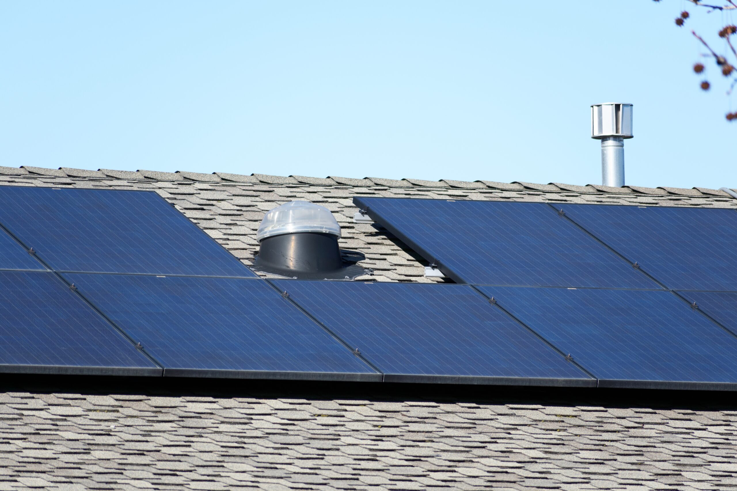solar panels on a shingled roof